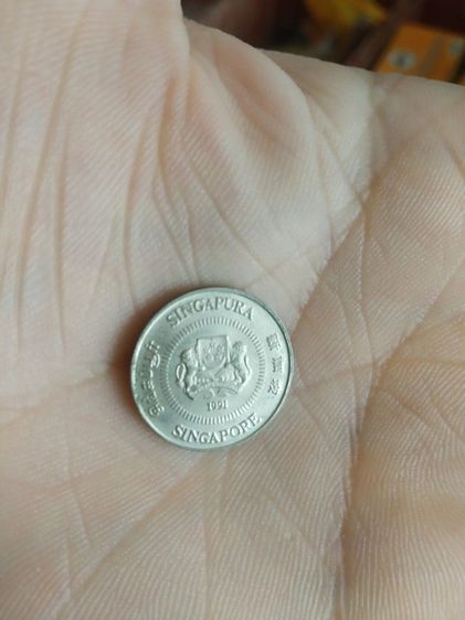 เหรียญประเทศสิงคโปร์(เหรียญประเทศสิงคโปร์ชนิด10เซนต์(เหรียญกษาปณ์ที่ใช้หมุนเวียน)(ถูกผลิตขึ้นในปีคริสตศักราช1991))สำหรับเอาไว้สะสมหรือโชว์ รูปที่ 5