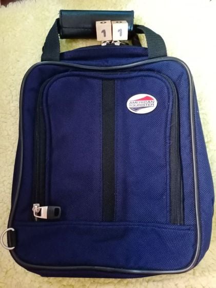 กระเป๋าใส่ของเดินทางสีน้ำเงิน American tourister