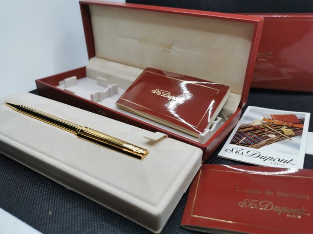 ขายปากกาS.T.DUPONTลูกลื่นสีทอง ครบกล่อง ใหม่เก่าเก็บ 27ปียังเขียนได้สุดยอด