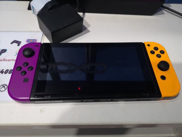 Nintendo​ Switch​ v2​ 128จิกสายมืด ติดชิฟ มีฟรีช็อป โหลดลบเกม​ได้เลยเพียงเชื่อม​ไวไฟ​ อุปกรณ์​มี​เครื่อง​ เมม จอยคอน และที่ชาร์จ​ รูปที่ 4