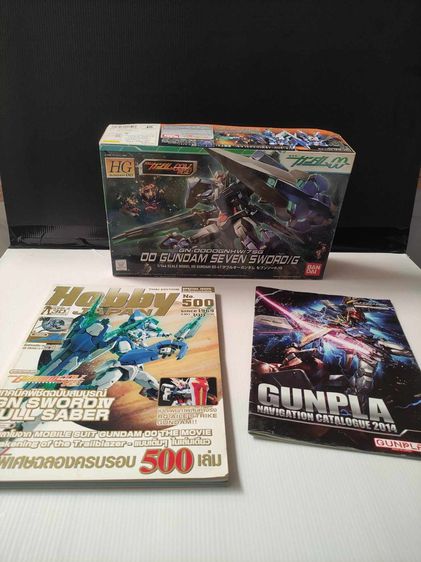 โมเดล Bandai  OO Gundam Seven Sword-G (HG 1-144) และหนังสือ Hobby Japan ภาษาไทย 