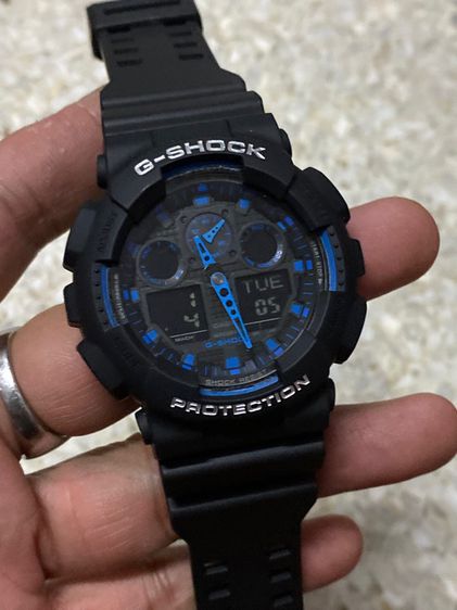 G-Shock ดำ นาฬิกายี่ห้อ G SHOCK GA100 ของแท้มือสอง ตามสภาพกระจกมีรอย สายเปลี่ยนมือ1 มาใหม่ 850฿