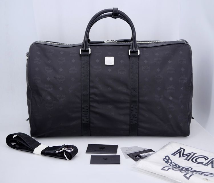 อื่นๆ ผ้า ไม่ระบุ ดำ กระเป๋าเดินทางmcm travel bag size 50 cm