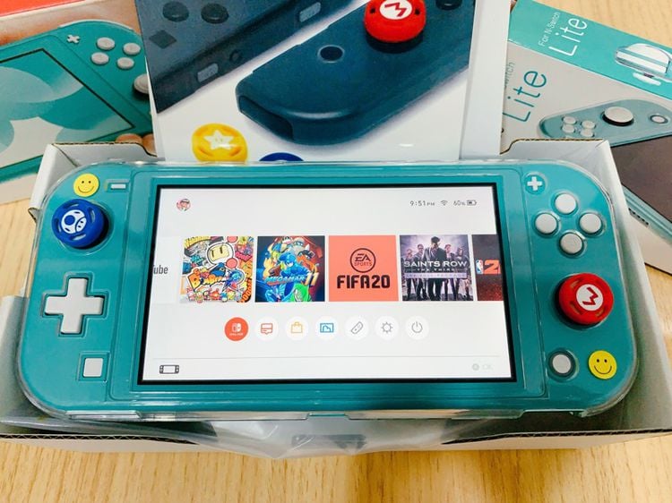 เกมส์นินเทนโด และอุปกรณ์ Nintendo switch lite สีเขียว มือสอง อุปกรณ์ครบกล่อง