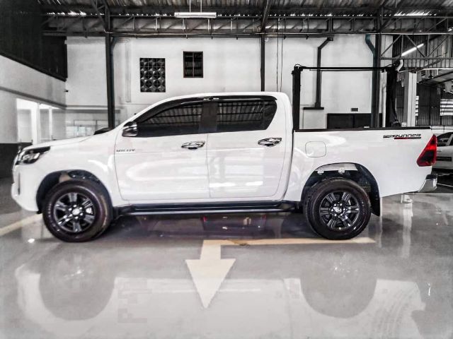 Toyota Hilux Revo 2022 2.4 E Prerunner Pickup ดีเซล เกียร์ธรรมดา ขาว รูปที่ 4