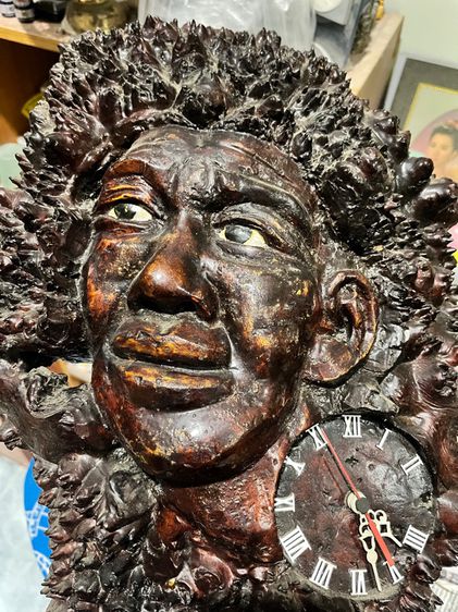 นาฬิกาแขวนไม้รูปหน้าคน