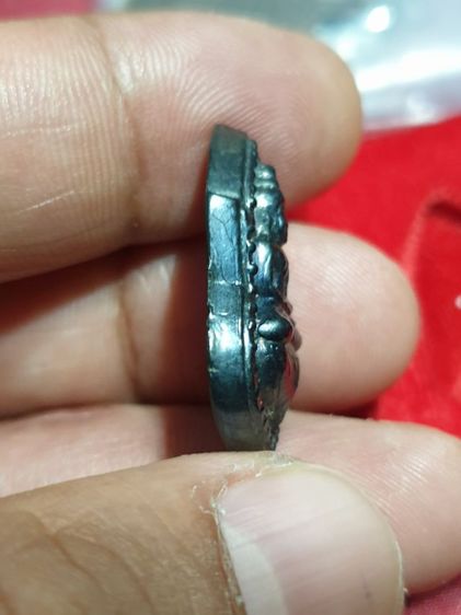 เหรียญหล่อโบราณ เนื้อเมฆพัตร หลวงพ่อโต วัดหลักหก จ.ราชบุรี พ.ศ.๒๕๓๔

 รูปที่ 6