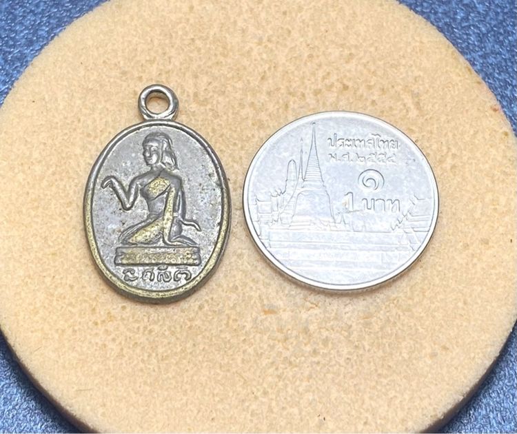 เหรียญนางกวัก หลังพระพุทธ หลวงพ่อจง วัดหน้าต่างนอก ( องค์ที่ 2 )  ปี 2500   นครศรีอยุธยา     P 583 รูปที่ 11