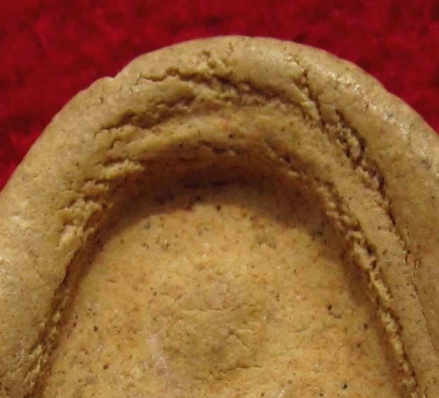 พระปิดตา หลังพระสังกัจจายน์  หลวงปู่เฮี้ยง  วัดป่าอรัญญิการาม  ปี 2505     P 58 รูปที่ 5