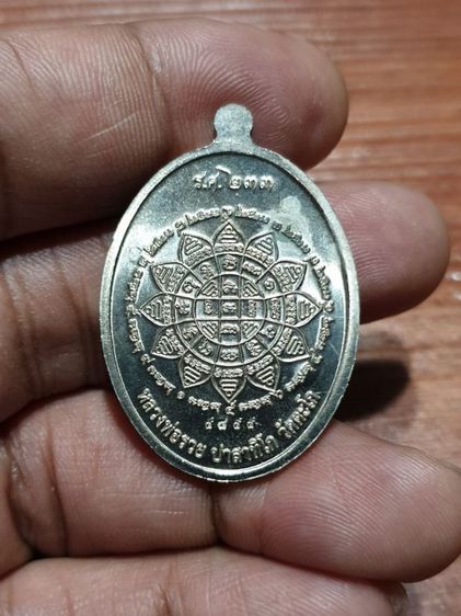 เหรียญหลวงพ่อรวย รุ่น รวยคูณ ทอง ปี 57เนื้ออัลปาก้า หายากแล้ว สภาพสวยเดิม รับประกันพระแท้ ตอกโค๊ตชัดเจน รูปที่ 6