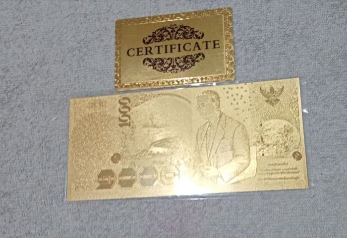 ธนบัตร1000​เคลือบทอ