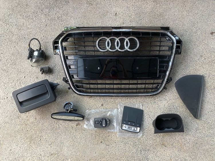 อะไหล่ Audi A1 กระจังหน้า ปรับไฟหน้า Q3 ไฟเพดาน วางแก้วน้ำ กระจกมองหลัง สปอร์ตไลท์ขวา แผ่นปิดคอนโซล กล่องใต้เบาะ กันชนหลัง ล้อ Sline 18