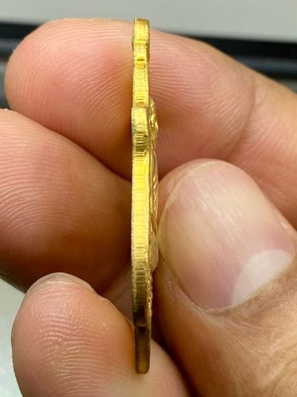 เหรียญหลวงพ่อกวย หลังยันต์ รูปที่ 3