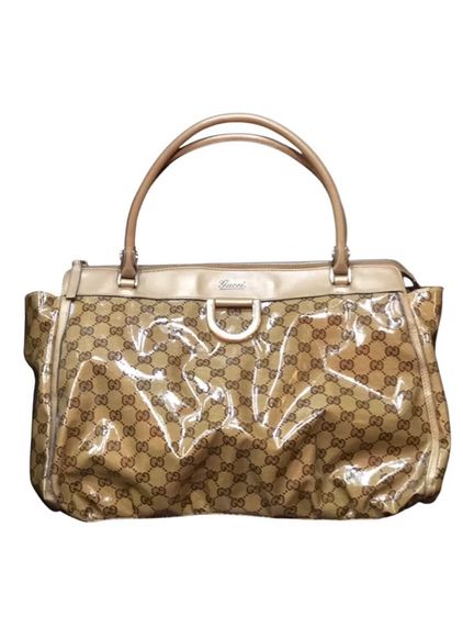 ไม่ระบุ กระเป๋าโท๊ททรง D-Ring ของ Abbey Gucci Gold GG Crystal รับประกันของแท้ 