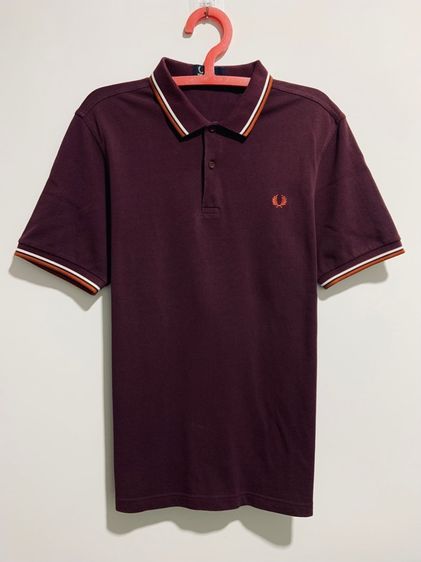 เสื้อโปโล FRED PERRY แท้ 💯 size L วัดจริงขนาด อก 21 ยาว 28 นิ้ว สภาพดีมาก ทรงสวย เนื้อผ้าดีมาก หายากน่าสะสมครับ
