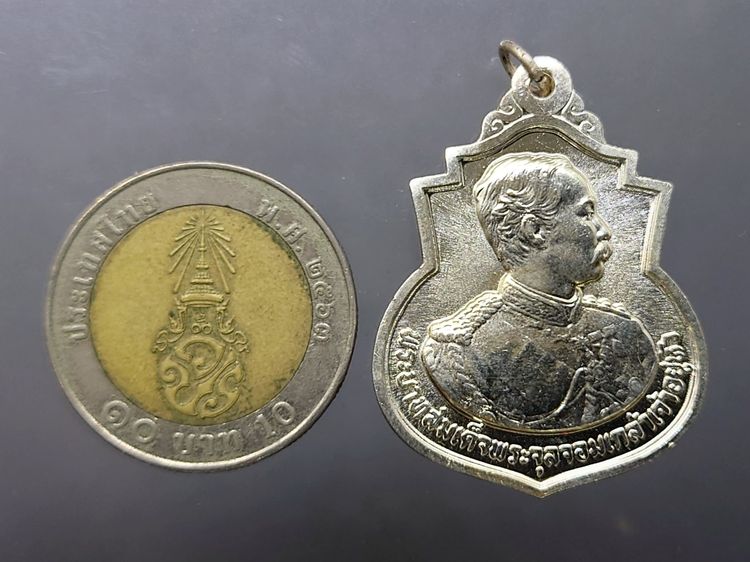 เหรียญ ร.5 ที่ระลึกครบรอบ 111 ปี โรงเรียนนายร้อยพระจุลจอมเกล้า จปร เนื้อเงิน พ.ศ.2541 พร้อมกล่องเดิม รูปที่ 7