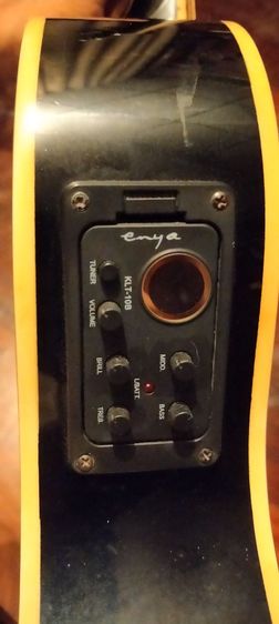 


กีตาร์โปร่งไฟฟ้า Enya 
พร้อมขาตั้ง คาร์โป้ , ทีตั้งเสียง joyo ของสะสมเล่นน้อยมาก (นัดรับ) รูปที่ 10