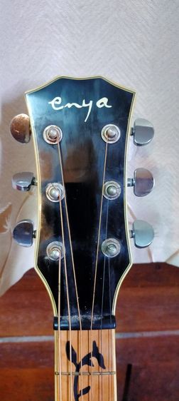 


กีตาร์โปร่งไฟฟ้า Enya 
พร้อมขาตั้ง คาร์โป้ , ทีตั้งเสียง joyo ของสะสมเล่นน้อยมาก (นัดรับ) รูปที่ 4