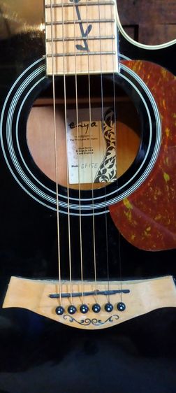 


กีตาร์โปร่งไฟฟ้า Enya 
พร้อมขาตั้ง คาร์โป้ , ทีตั้งเสียง joyo ของสะสมเล่นน้อยมาก (นัดรับ) รูปที่ 2