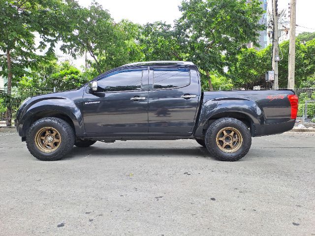 Isuzu D-MAX 2013 3.0 V-Cross Z Prestige 4WD Pickup ดีเซล ไม่ติดแก๊ส เกียร์ธรรมดา ดำ รูปที่ 3