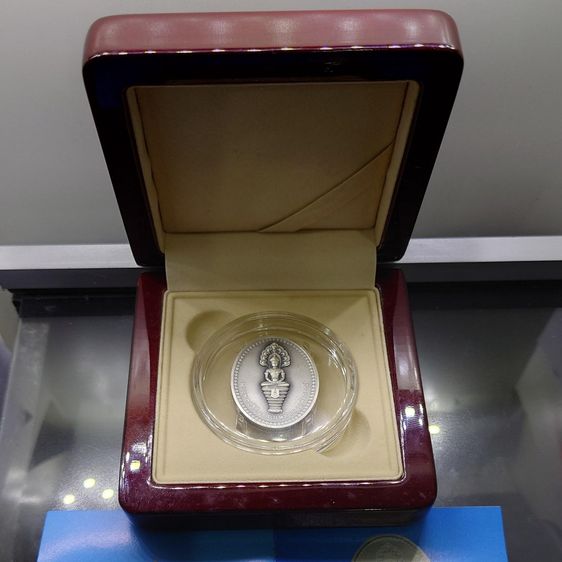 เหรียญพระพุทธสิรินาคเภษัชยคุรุจุฬาภรณ์ (เหรียญพระพุทธโอสถ) เนื้อเงินรมดำ พ.ศ. 2558 ที่ระลึก 90 พรรษา ในหลวงรัชกาลที่ 9 - โรงพยาบาลจุฬาภรณ์