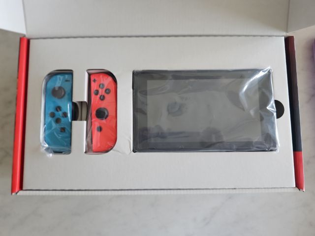 (มือ2) Nintendo Switch Neon Red,Blue สภาพดี แถมเคสJoy-Con พร้อมฟิล์ม รูปที่ 2