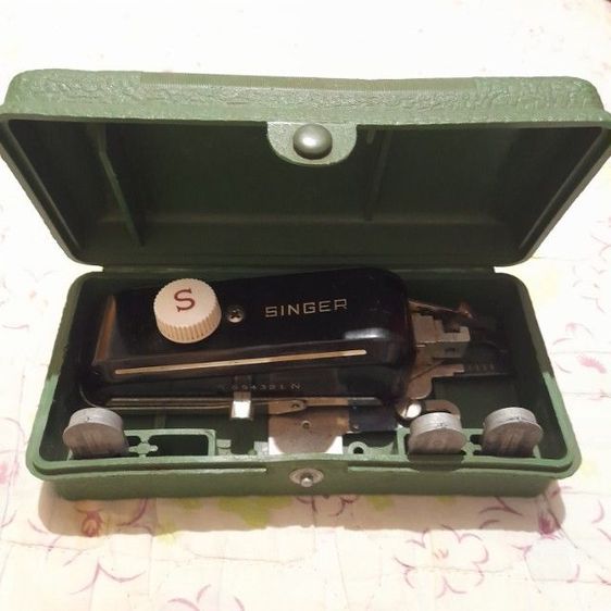 Singer ที่เย็บรังดุม