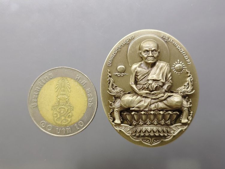 เหรียญหลวงพ่อทวดนั่งพาน รุ่น1 พิมพ์รูปไข่ เนื้ออัลปาก้า พุทธอุทยานมหาราช วัดวชิรธรรมาราม ปี2556 พร้อมกล่องเดิม รูปที่ 8