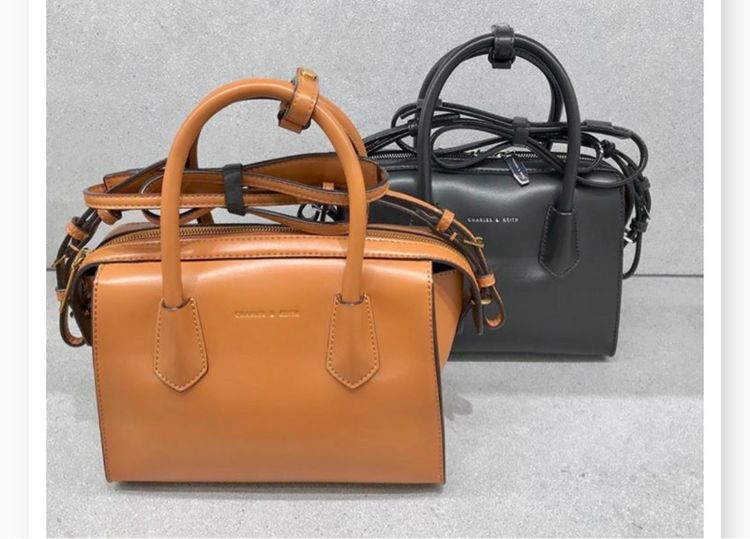 CHARLES KEITH กระเป๋าสะพายทรงหมอนสีน้ำตาล Bags. Brown mid-sized top handle bag