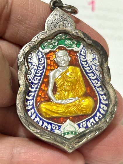 	เหรียญเสมา ๗ รอบ หลวงพ่อจรัญ วัดอัมพวัญ เนื้อเงินลงยา รูปที่ 10