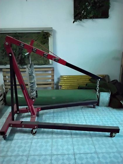 เครนเคลื่อนที่แบบพับได้ ยกของได้ 2000 kg.