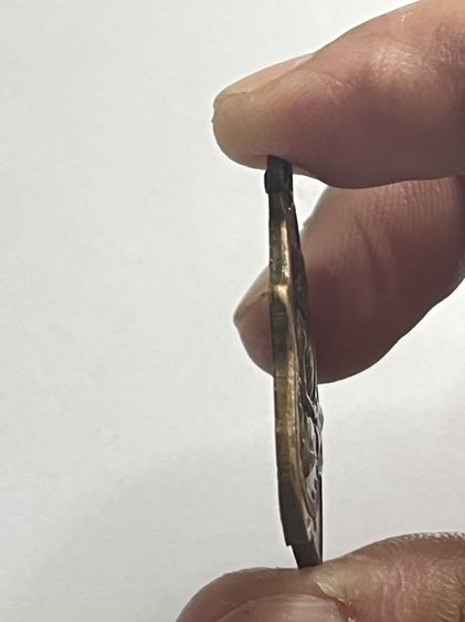 หลวงพ่อกวยเนื้อทองแดง