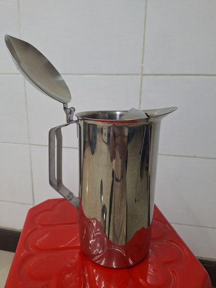 เหยือกน้ำเติมสแตนเลสมีฝา ตรานกนางนวลอย่างหนา มีฝาปิด ขนาด 11 ซ.ม.มือสอง สภาพใหม่