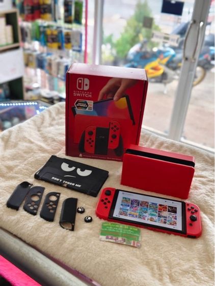 -  Nintendo Switch OLED Mario Red Edition