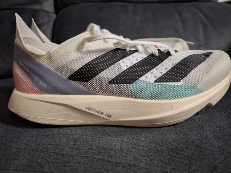 รองเท้า Adidas adizero takumi sen 9 silver violet cyan