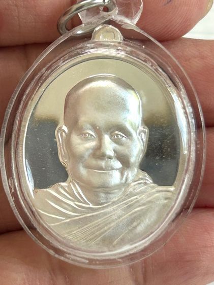 เหรียญรูปไข่ ฉลองอายุวัฒนะมงคล84ปี (7รอบ) หลวงพ่อจรัญเนื้อเงินผิวกระจก สวยพร้อมกล่องเดิม  รูปที่ 6