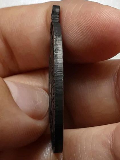 เหรียญหลวงพ่อคูณ ปี2517 ทองแดงรมดำ
 รูปที่ 4