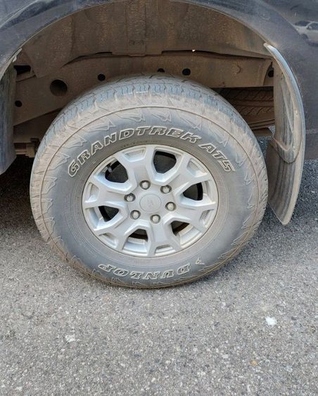 ขายแม็กพร้อมยาง ครบชุด(4 ล้อ) Dunlop AT5 หน้ากว้าง 265 แก้มสูง 70 ขอบ 16 ปี2024  ใช้งานน้อยเฉลี่ยวันละไม่ถึง 30 โล