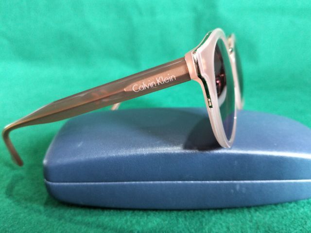 ขอขายแว่นตากันแดด unisex แบรนด์ Calvin Klein รุ่น CK4337SK แท้ผลิตในประเทศจีน ขนาด 53-23-140mm.กระจกดำก้านสีน้ำตาลอ่อน รูปที่ 6