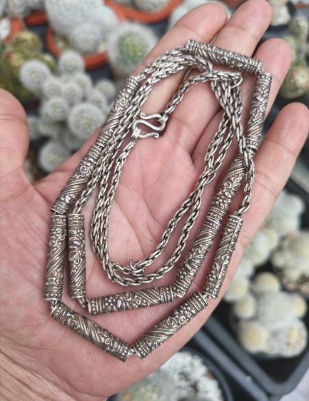 สร้อยคอเงินแท้พร้อมตะกรุดเงินแท้ 12 ดอก งานเก่า เพิ่งจะเคยเห็น ราคาแบ่งปันครับ