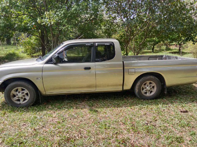 Mitsubishi L200-Strada 2001 รุ่นย่อยอื่นๆ Pickup ดีเซล ไม่ติดแก๊ส เกียร์ธรรมดา บรอนซ์ทอง รูปที่ 4