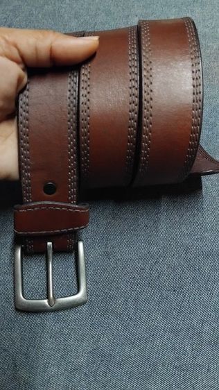 เข็มขัดหนังWARNGLER  มีกระดุมเป๊กถอดเปลี่ยนหัวหรือสายได้ เอว33-36.5 กว้าง1.3  ยาว43
