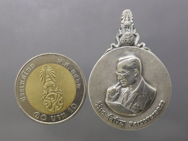 เหรียญพระมหาชนก เนื้อเงิน พิมพ์ใหญ่ บล็อก ป ขาด ปี2539 พร้อมหนังสือพระราชนิพนธ์ และกล่องเดิม อุปกรณ์ครบ รูปที่ 5