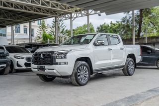 Mitsubishi Triton 2.4 ULTRA Double Cab Plus AT รุ่นท็อป มีวารันตีศูนย์เริ่ม เม.ย 2025 หมด เม.ย 2030  สีขาว ปี2023 จด2026 รถDemo Car 