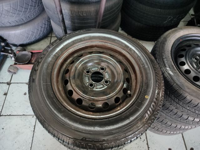 ล้อกะทะนิสสันขอบ14 4รู100พร้อมยาง