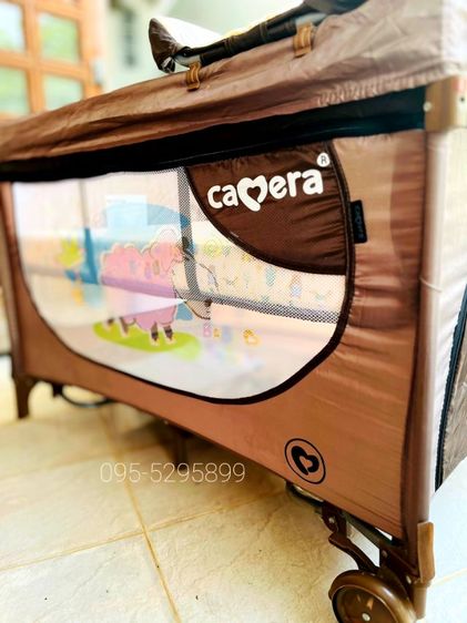 เปลเพนสองชั้น ยี่ห้อCAMERA  เปลเด็ก PLAYPEN
.
มาพร้อมที่เปลี่ยนผ้าอ้อม ถอดออกได้ มีช่องใส่ขวดนม รูปที่ 2