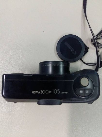 กล้องCanon Prima Zoom 105 Caption เป็นกล้องคอมแพค แบบออโต้โฟกัส ที่มีเลนส์ซูม 35-105 มม. f-3.5-8. มีขนาด 139 x 73 x 63 มม. น้ำหนัก 446 กรัม รูปที่ 4