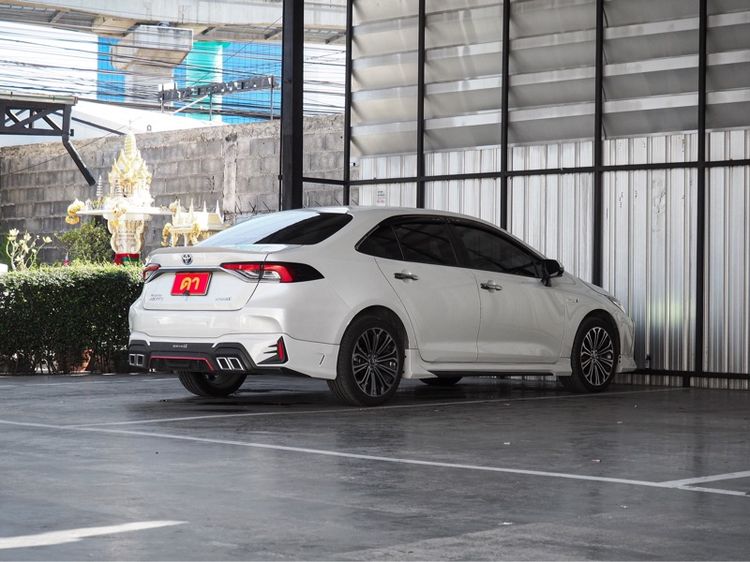 Toyota Altis 2021 1.8 Hybrid Premium Safety Sedan ไฮบริด ไม่ติดแก๊ส เกียร์อัตโนมัติ ขาว รูปที่ 4