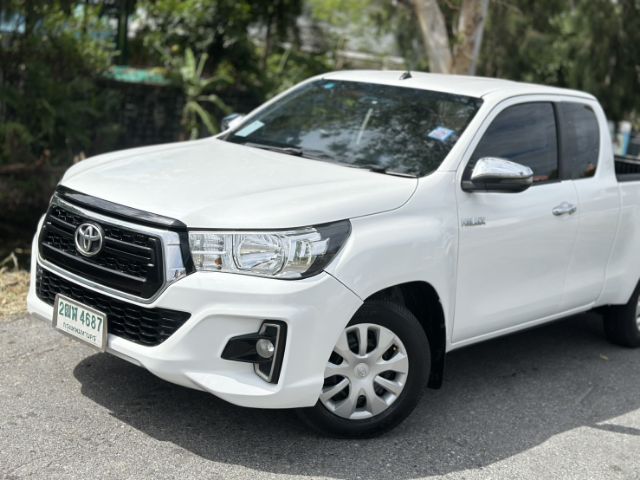 รถ Toyota Hilux Revo 2.4 J Plus สี ขาว