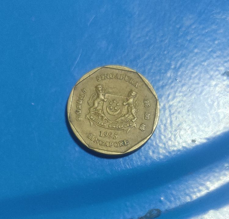เหรียญประเทศสิงคโปร์เหรียญประเทศสิงคโปร์ชนิด1ดอลลาร์เหรียญกษาปณ์ชนิดใช้หมุนเวียนถูกผลิตขึ้นในปีคริสตศักราช1988-1995สำหรับไว้สะสมหรือโชว รูปที่ 2